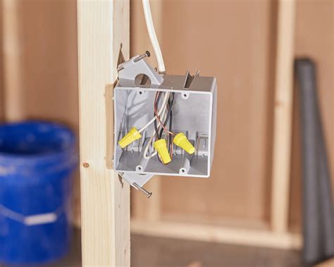 attach electrical box to stud thru hole|screwing electrical box into stud.